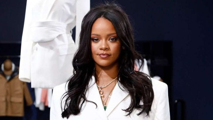Rihanna says she's spending her wealth equally from her splurges, investments, and giving back to charity works.